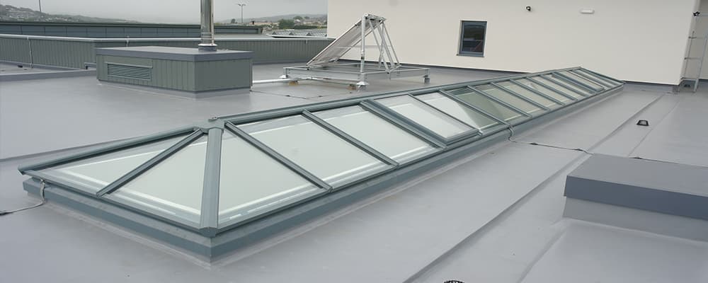 Skylight repair and replacement on a flat roof