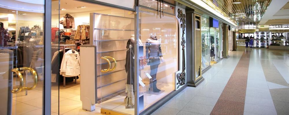 Retail storefront with glass entrance in a shopping mall
